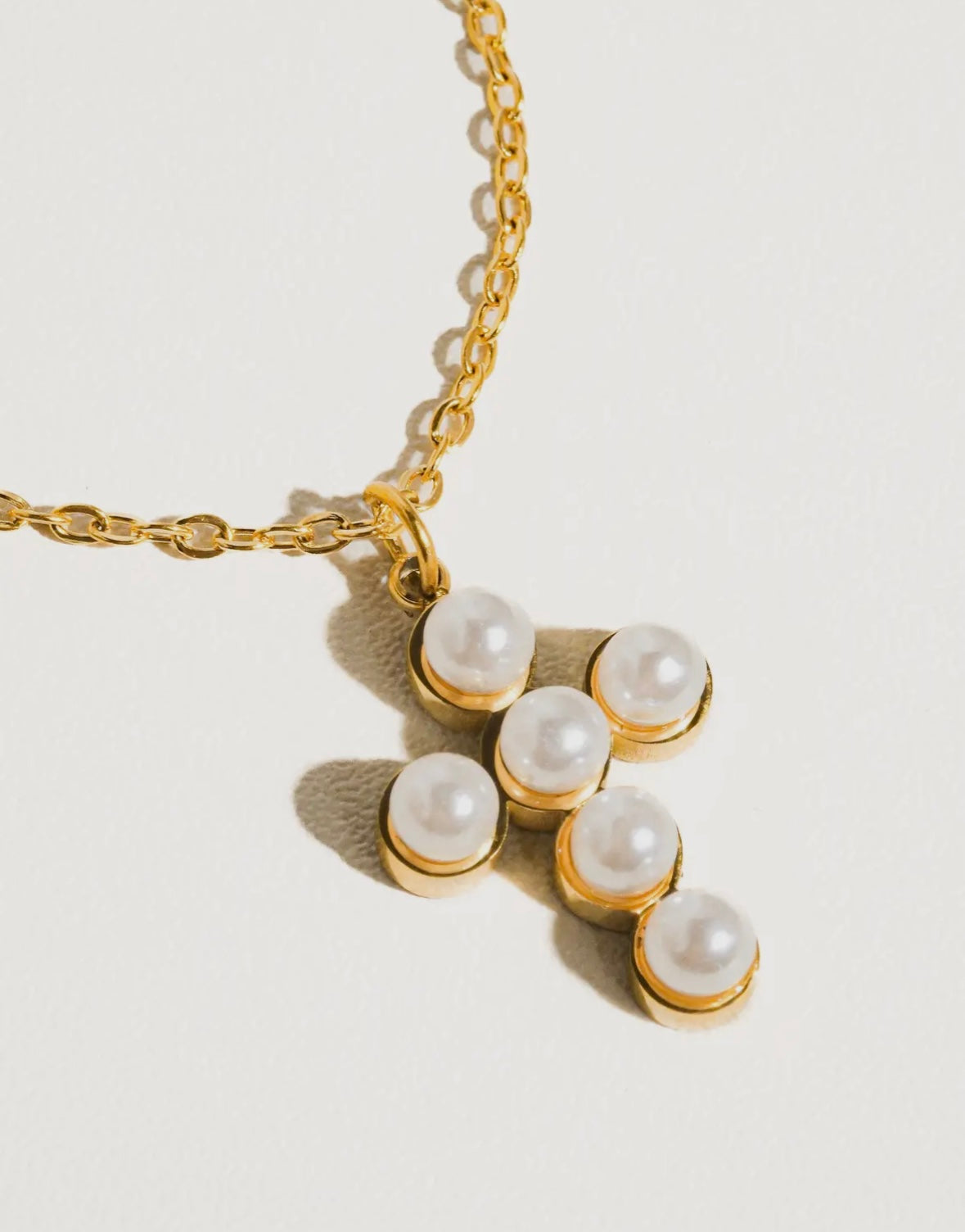 Gold plated pearl cross necklace